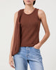 Woman wears Casasola Carolina knitted cotton brown tank top with matching bag and jeans