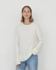 Model wears Casasola Maria knitted cashmere oversized crewneck sweater
