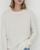 Model wears Casasola Maria knitted cashmere oversized crewneck sweater - detail view
