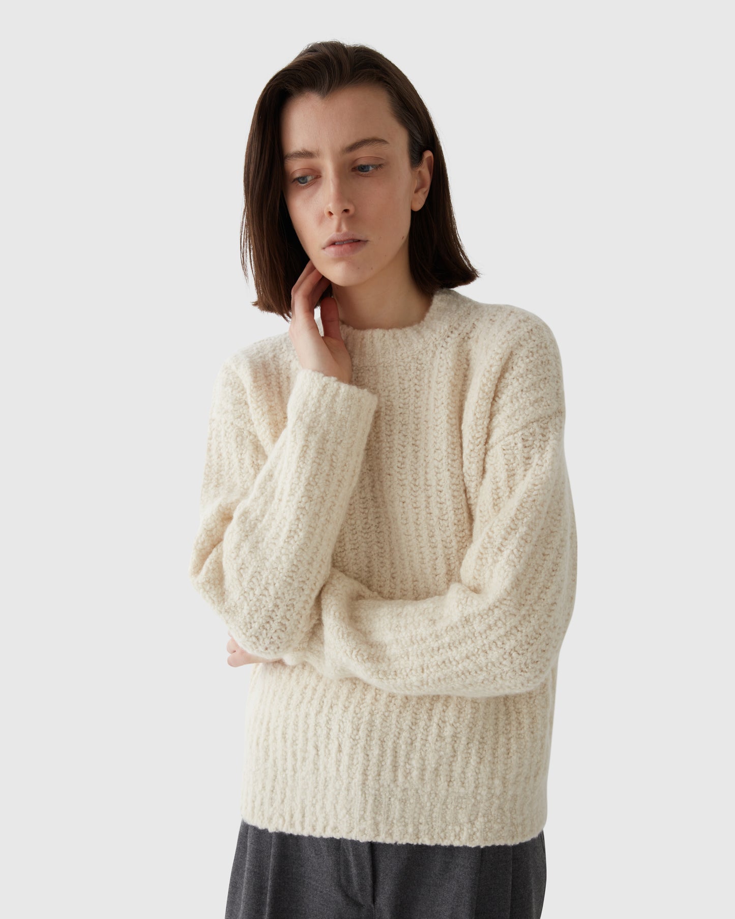 Women wears Casasola Orso Cashmere Silk Off-White Boucle Crewneck - Front View
