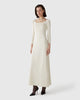 Model wears Casasola silk-knit mid-length strapless dress in off-white