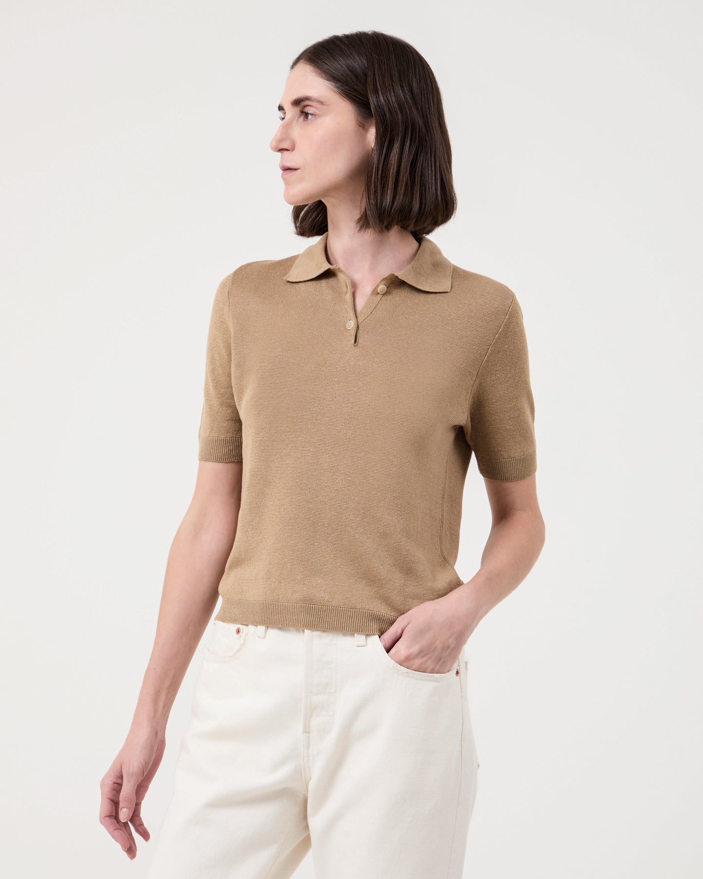 Woman wearing Casasola Daria Linen Camel Polo Top  - front view