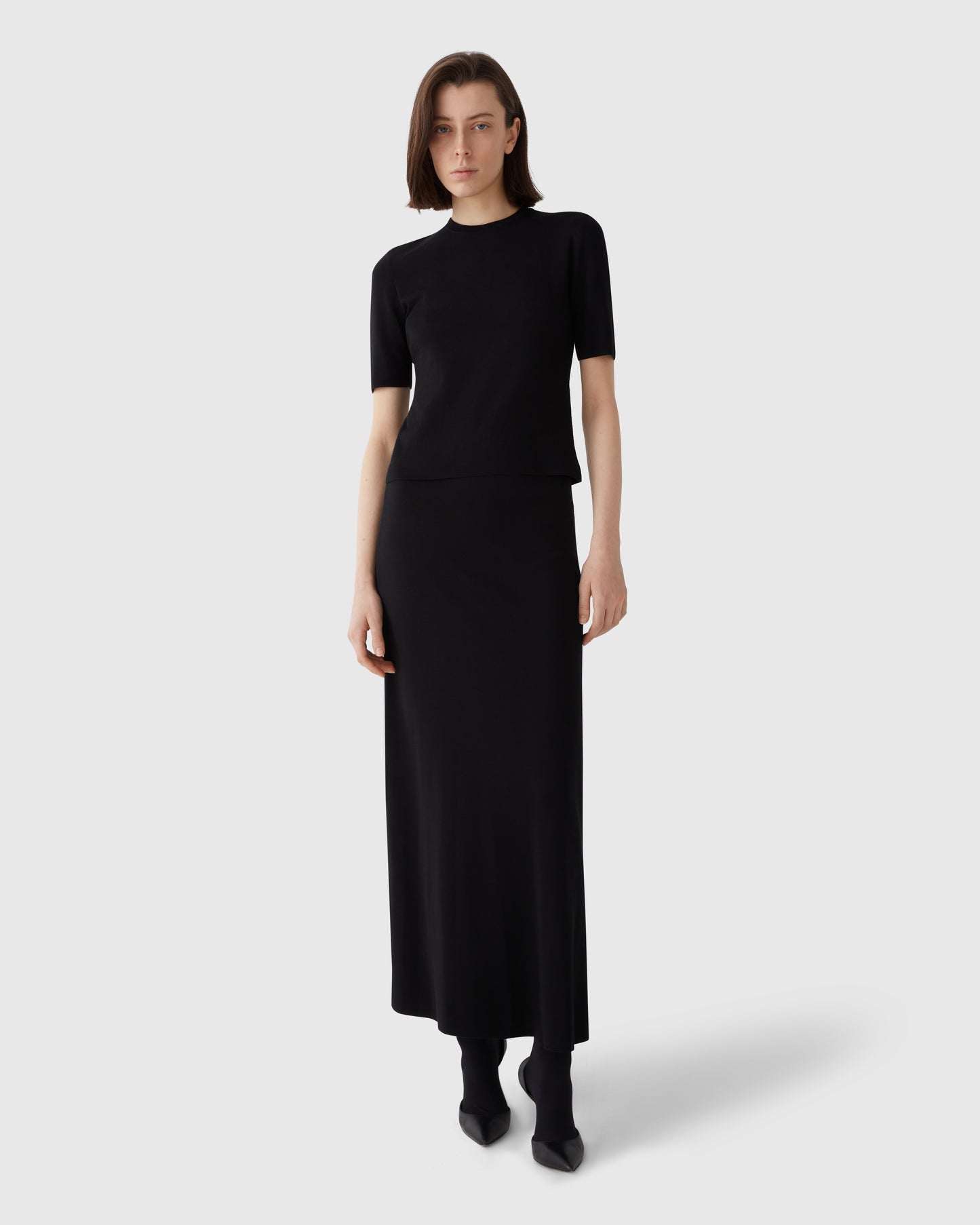 Woman Wearing Eva Knitted Silk Top Black - Front View