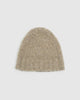 A beige, unisex beanie made of fleece cashmere and silk