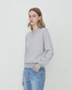 Woman wears Casasola Giada Wool V-Neck sweater in Grey - front view