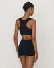 Woman wearing Casasola Lucia knitted culottes with cropped top