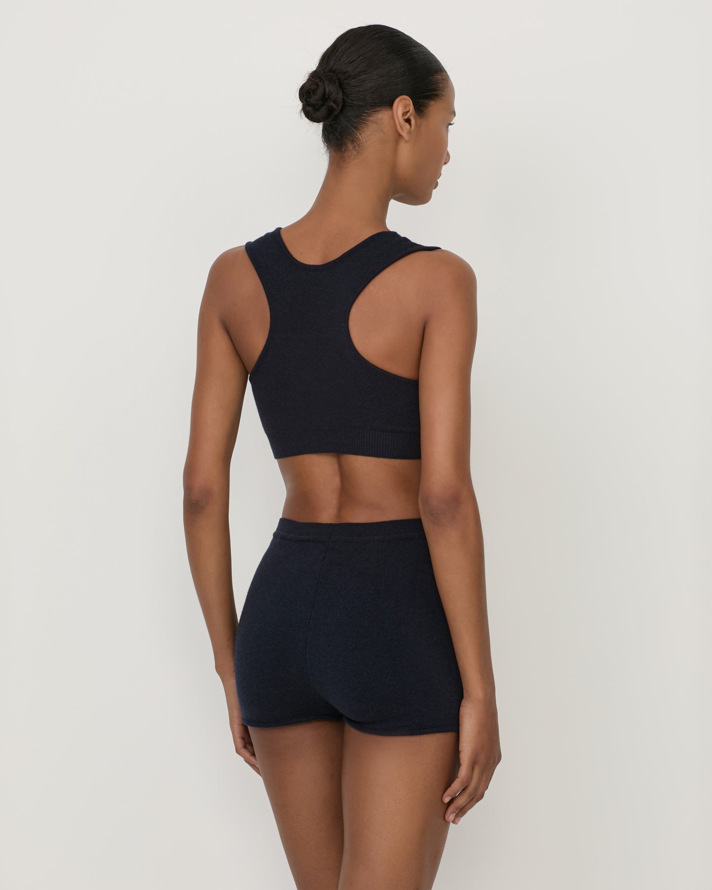 Woman wearing Casasola Lucia knitted culottes with cropped top