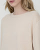 Woman wears Casasola Maria knitted cashmere crewneck oversized sweater - detail view