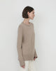 Woman wears Casasola Maria knitted cashmere oversized crewneck - side view