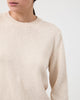 Woman wears Casasola Nina knitted cotton crewneck white - detail view