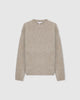 Casasola Orso beige-colored, oversized, four-ply knitted cashmere-silk sweater with a ribbed mock neckline, front view.