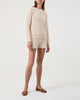 Model wearing Casasola Ottavia heavyweight knitted cotton white crewneck with matching shorts
